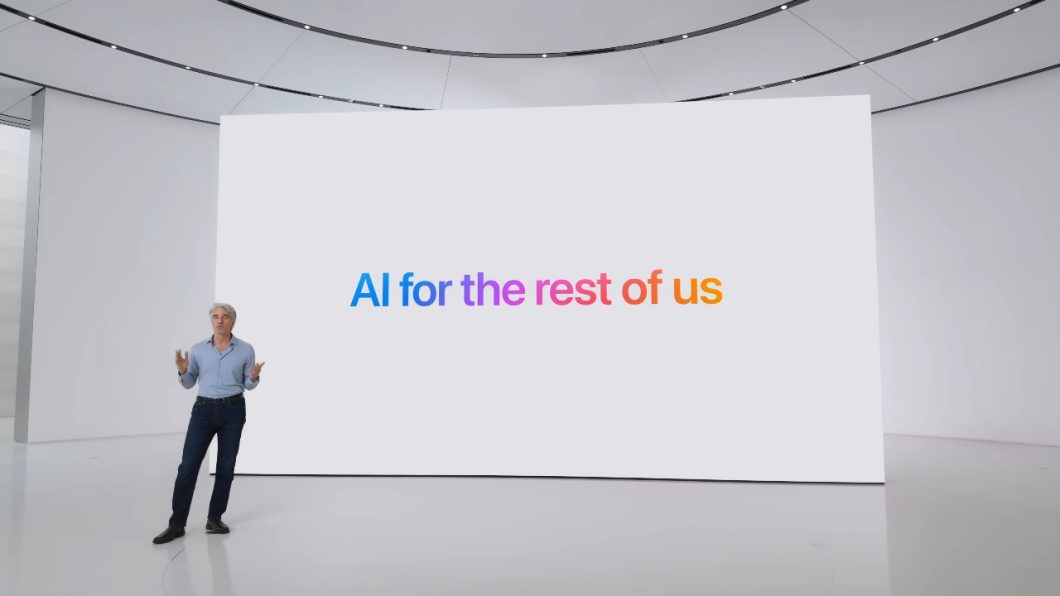 Craig Federighi diante de uma tela que diz "IA para o resto de nós", durante a WWDC 2024